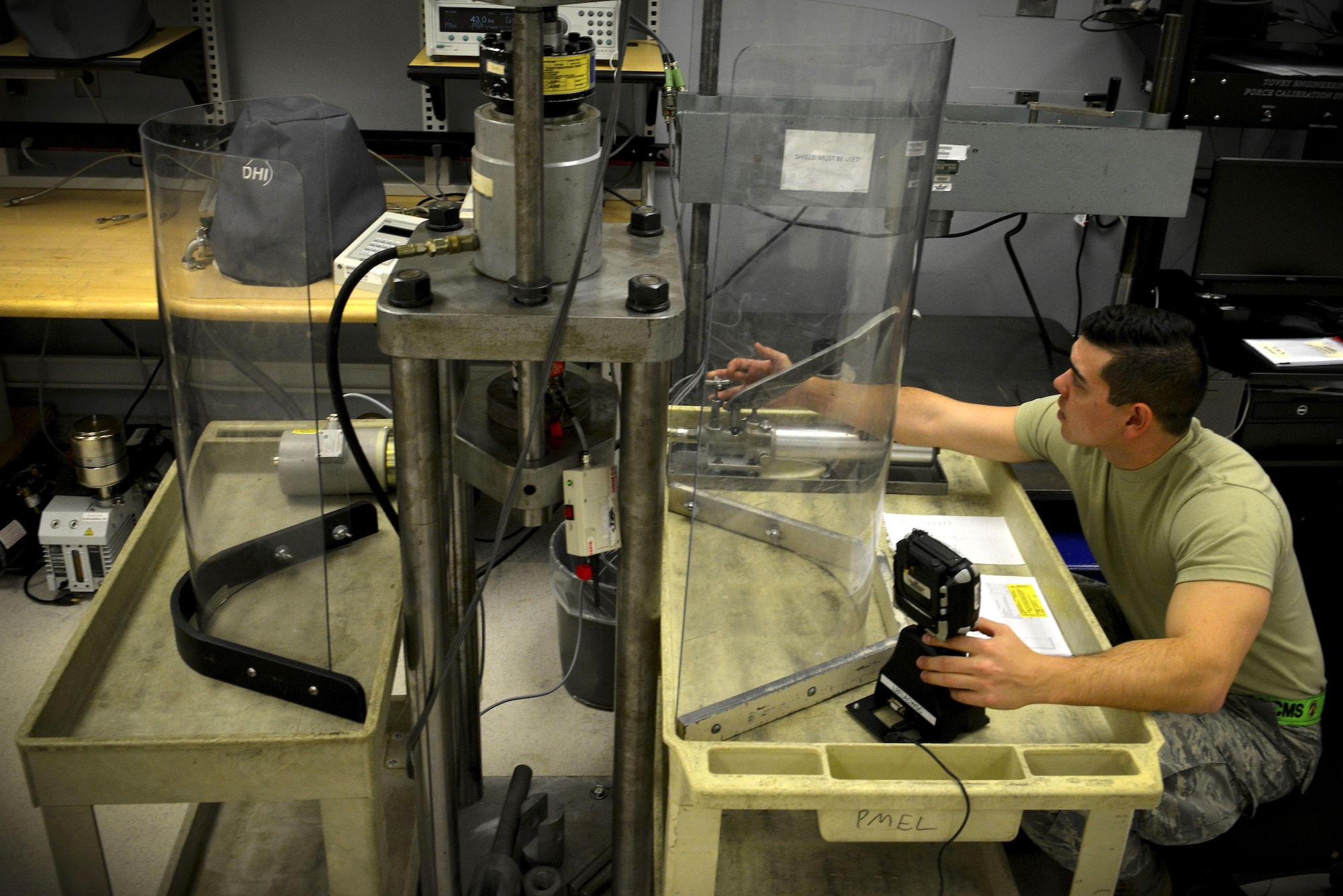 U.S. Air Force Airman 1st Class Jeremiah Zimmer, 20th Component Maintenance Squadron precision measurement equipment laboratory journeyman, calibrates a load cell at Shaw Air Force Base, S.C., Dec. 21, 2016. The PMEL flight is capable of calibrating approximately 9,500 different pieces of equipment, helping to maintain the overall readiness and capabilities of the Air Force. (U.S. Air Force photo by Airman 1st Class Destinee Sweeney)