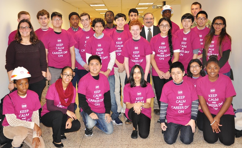 Students from New York City high schools sport T-shirts emblazoned with the slogan, “Keep Calm and Career Day On” as part of STEM (science, technology, engineering and math) Career Day where they learned about science and engineering careers from professionals in the field. District personnel Kara Borzillo (left) and Mike Rovi (in jacket and tie) gave interactive presentations. (Photo: James D’Ambrosio, Public Affairs Specialist).