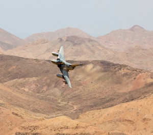 A French Airman operating a Force Mirage 2000B fixed-wing aircraft conducts a show of force at AS-01 Range complex in Djibouti, Africa, Oct. 18, 2016. The training, conducted between U.S. Marines with Special Purpose Marine Air Ground Task Force-Crisis Response-Africa and French Fighter Squadron 3/11, was intended to establish bilateral standard operating procedures and strengthen international working relationships. (U.S. Marine Corps photo by Staff Sgt. David L. Proffitt)