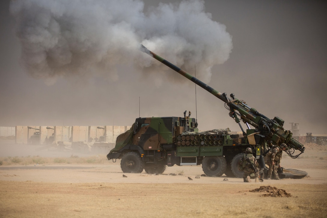 French soldiers conduct a fire mission at Qayyarah West, Iraq, in support of the Iraqi security forces’ advance toward Mosul, Oct. 17, 2016. The support provided by the Caesar truck- mounted artillery system teams denies the Islamic State of Iraq and the Levant (ISIL) safe havens while providing the ISF with vital artillery capabilities during their advance. The United States stands with a Coalition of more than 60 international partners to assist and support the Iraqi security forces to degrade and defeat ISIL.  (U.S. Army photo by Spc. Christopher Brecht)