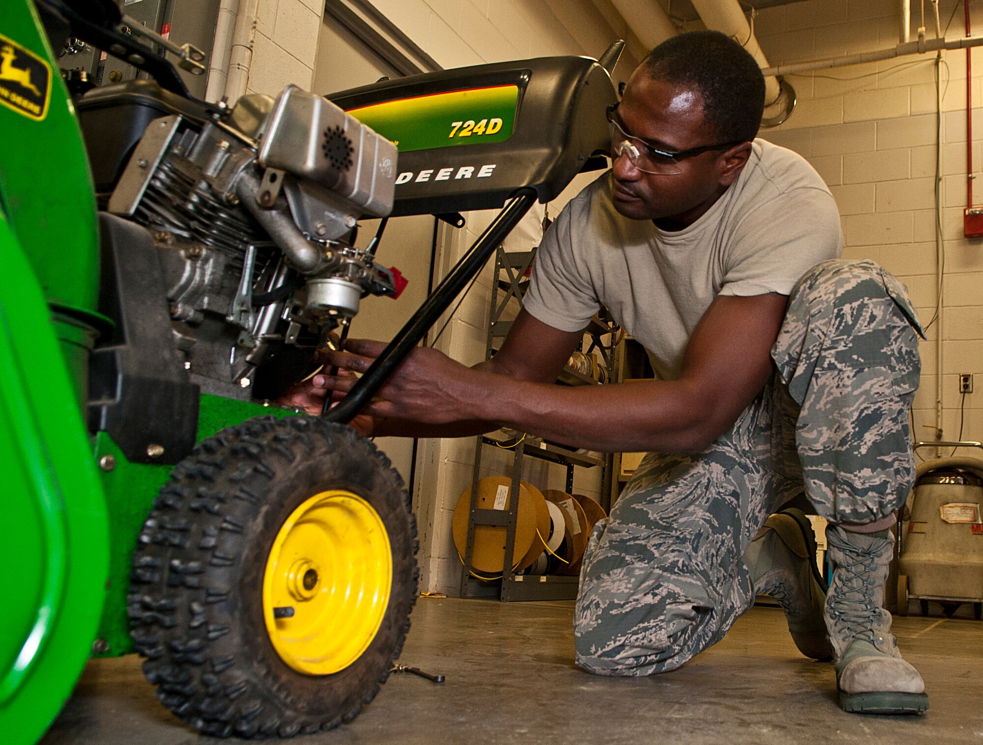Staff Sgt. Mario Fortenberry, 5th Maintenance Operations flight circuit card repair technician, replaces a snow blower pull cord at Minot Air Force Base, N.D., Jan. 10, 2017. The AFREP is responsible for preventing the Air Force from spending money to fix equipment initially deemed beyond repair. (U.S. Air Force photo/Airman 1st Class Jonathan McElderry)