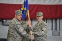 Col. Harry Seibert, left, commander of the 1st Special Operations Maintenance Group, presents Lt. Col. Philip Broyles, commander of the 1st Special Operations Aircraft Maintenance Squadron, with the 1st SOAMXS guidon during an assumption of command ceremony at Hurlburt Field, Fla., Jan. 12, 2017. Broyles previously served as the commander of the 801st Special Operations Aircraft Maintenance Squadron. (U.S. Air Force photo by Airman 1st Class Joseph Pick)