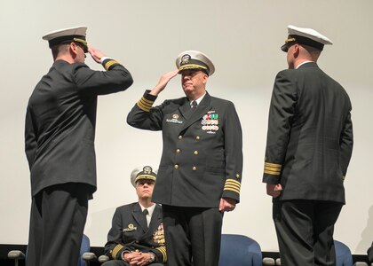 KEYPORT, Wash. (Jan. 13, 2017) Cmdr. John Cage, from Jefferson City, Missouri, left, requests to be relieved of command by Capt. Mark Schmall, Commander, Submarine Squadron 17, center, during a change of command ceremony for the Blue Crew of the Ohio-class ballistic-missile submarine USS Pennsylvania (SSBN 735). During the ceremony, held at the Keyport Undersea Museum, Cage turned over command to Cmdr. Steven Everhart, from Great Falls, Montana. (U.S. Navy photo by Mass Communication Specialist 1st Class Amanda R. Gray/Released)
