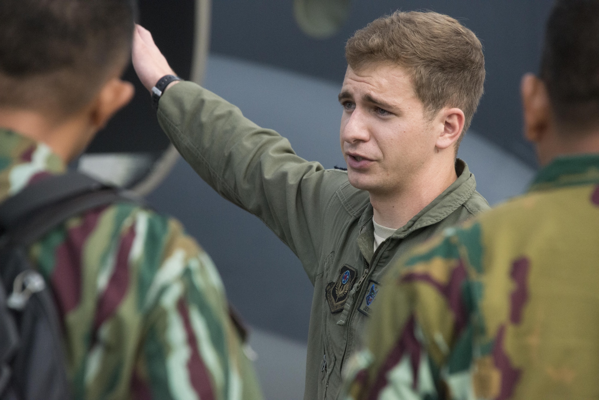 Capt. Jerome Harms, 17th Special Operations Squadron pilot, explains the features of the MC-130J Commando II to Indonesian Air Force leadership during a flightline tour, December 5, 2016. Joint Special Operations Command-Pacific (JSOAC-P) demonstrated the benefits of continual partnership building during a visit by Indonesian Air Force leadership to Kadena Air Base, December 4-8, 2016. (U.S. Air Force photo by Capt. Jessica Tait)