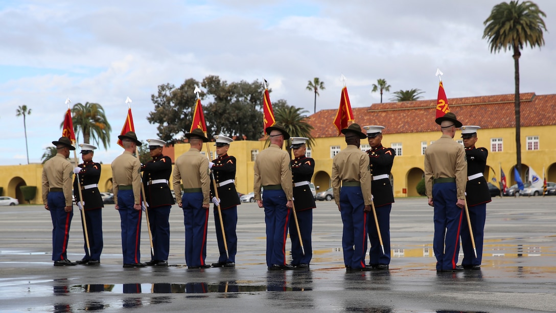 The honormen of Fox Company, 2nd Recruit Training Battalion, return the guidons to their drill instructors during the graduation ceremony at Marine Corps Recruit Depot San Diego, Jan. 13. These guidons have been carried by the platoon guides for the duration of training, and this portion of the ceremony marks the disbanding of the platoons. Annually, more than 17,000 males recruited from the Western Recruiting Region are trained at MCRD San Diego.