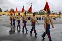 Drill instructors from Fox Company, 2nd Recruit Training Battalion, march in formation after receiving the guidons from the company honormen during the graduation ceremony at Marine Corps Recruit Depot San Diego, Jan. 13, 2017. These guidons have been carried by the platoon guides for the duration of training, and this portion of the ceremony marks the disbanding of the platoons. Annually, more than 17,000 males recruited from the Western Recruiting Region are trained at MCRD San Diego.