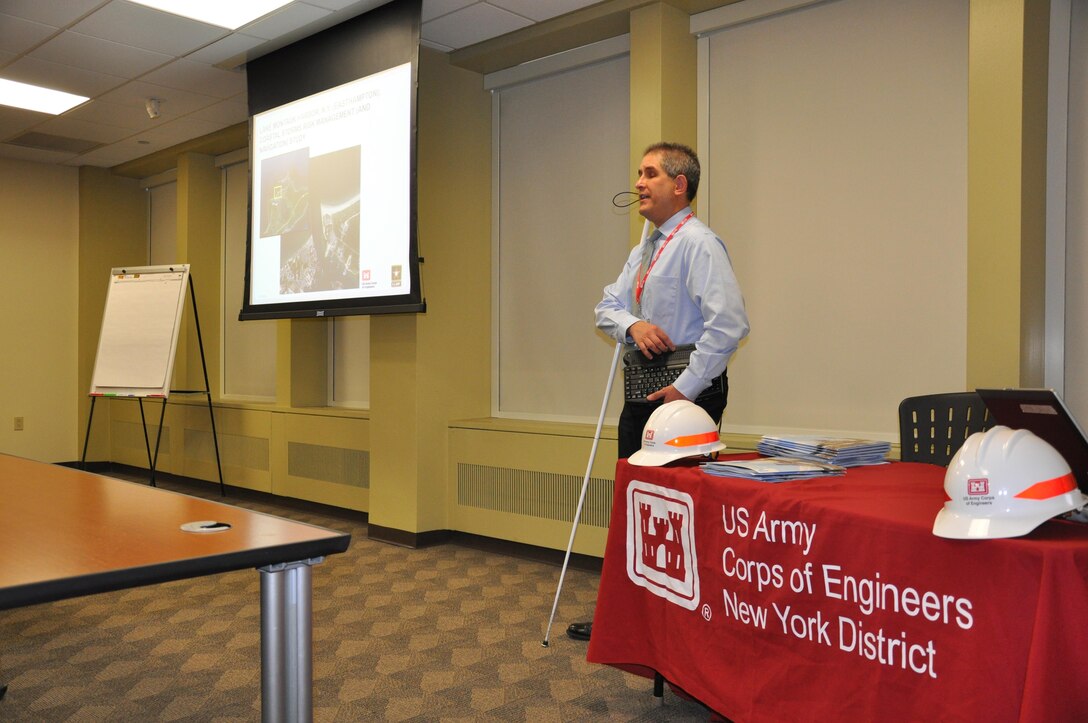 Nathanael Wales, a civil engineer in the Planning Division, presents during STEM (science, technology, engineering and math) Career Day at the U.S. Army Corps of Engineers, New York District. He spoke about shoreline erosion and the many processes the Corps must complete before constructing a civil works project. (Photo: James D’Ambrosio, Public Affairs Specialist).