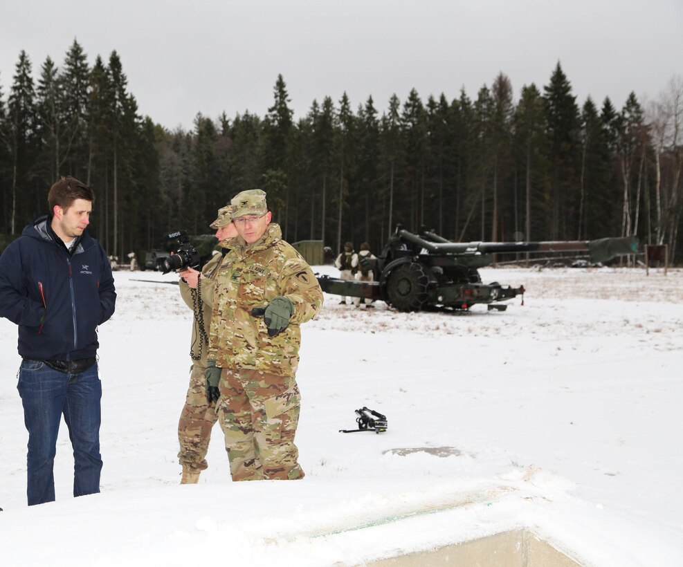 Chris Bailey, left, the U.S. Army Corps of Engineers Europe District project engineer in Estonia, briefs Col. John Baker, right, chief engineer for U.S. Army Europe, on newly constructed machine gun and sniper ranges built through the European Reassurance Initiative to enhance readiness of U.S., Estonian and NATO forces Dec. 14 at Tapa Training Area, Estonia.  