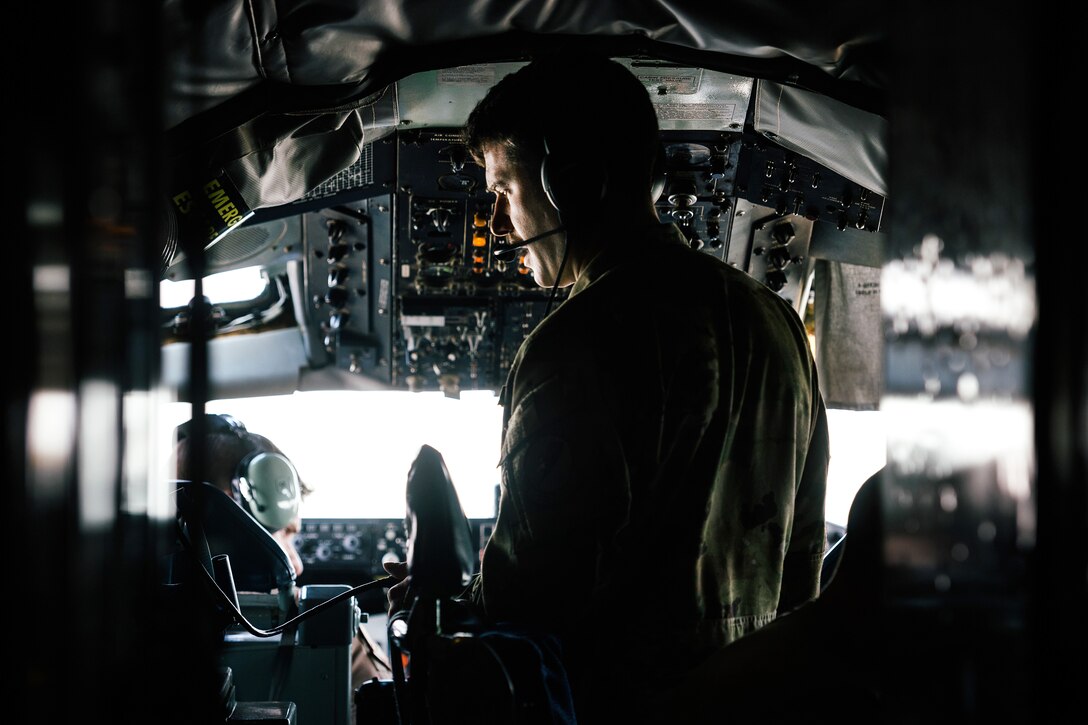 Air Force Capt. Seth Ratner conducts a preflight check inside the cockpit of a KC-135 Stratotanker before taking off for a refueling mission at Al Udeid Air Base, Qatar, Jan. 11, 2017. Ratner is a pilot assigned to the 340th Expeditionary Air Refueling Squadron. Air Force photo by Senior Airman Jordan Castelan 