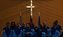 Members of the Vogelweh Gospel Choir prepare to sing at a Martin Luther King Jr. commemoration at Ramstein Air Base, Germany, Jan. 13, 2017. Dr. King grew further confidence in his public speaking ability through choir, something his mother encouraged him to do throughout his younger years. (U.S. Air Force photo by Airman 1st Class Lane T. Plummer)