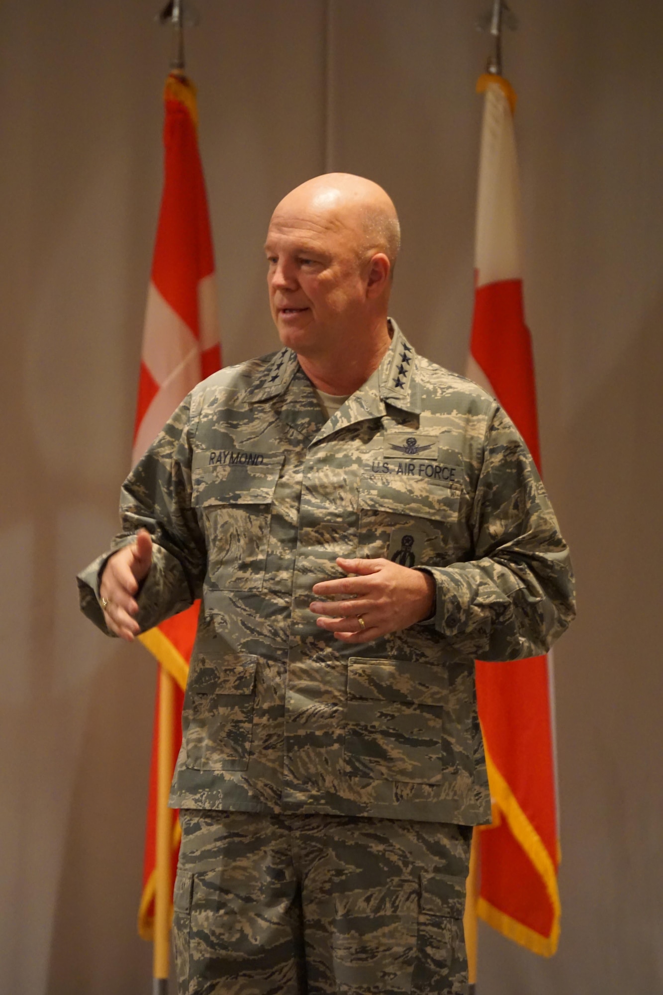 THULE AIR BASE, Greenland – Gen. Jay Raymond, Air Force Space Command commander, conducts an All Call at Thule Air Base, Greenland, Jan. 5, 2017. Raymond discussed the importance of space and cyber to provide national security. (U.S. Air Force photo by 1st Lt. Kaylan Lee)