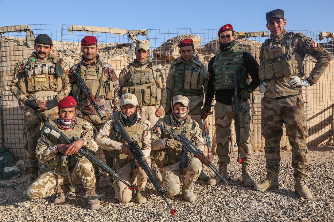 Iraqi soldiers from 7th Iraqi Army Division take a break from infantry squad training at Al Asad Air Base, Iraq, Jan. 14, 2017. Training at building partner capacity sites is an integral part of Combined Joint Task Force – Operation Inherent Resolve’s global Coalition effort to train Iraqi security forces personnel to defeat ISIL. CJTF-OIR is the global Coalition to defeat ISIL in Iraq and Syria. (U.S. Army photo by Sgt. Lisa Soy)