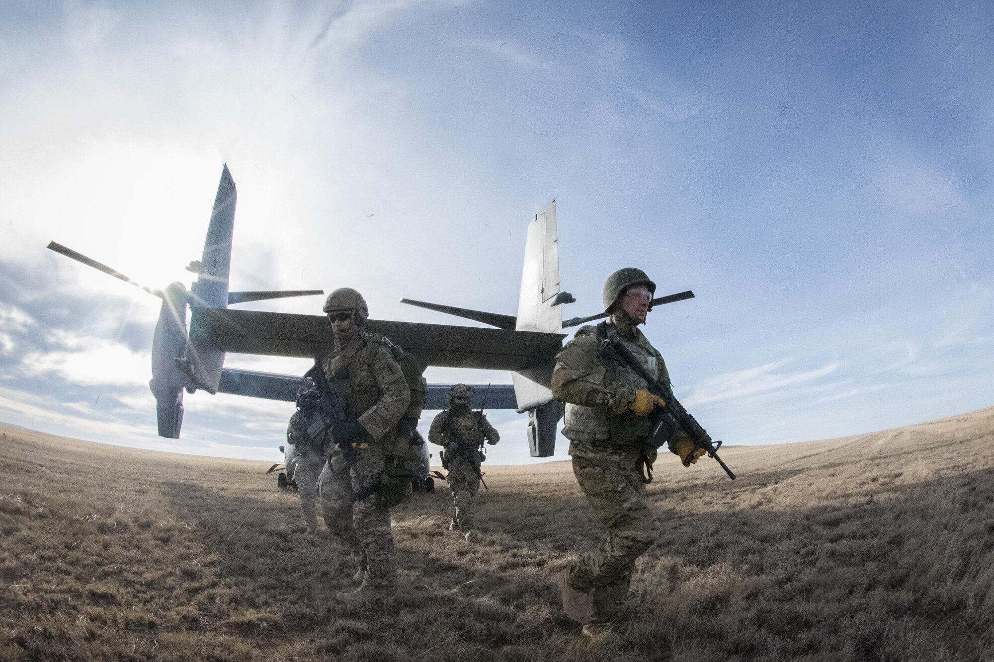 Airmen participating in the Green Beret Experience infiltrate a training area Dec. 15, 2016, at Melrose Air Force Range, N.M. Airmen assigned to Cannon Air Force Base, N.M., were trained and tutored by U.S. Army Green Berets over a four day period to get an in-depth experience of all the facets of tactical ground operations. (U.S. Air Force photo by Senior Airman Shelby Kay-Fantozzi/Released)