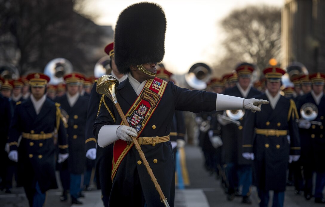 The Drum Major leads the U.S. Army Band, "Pershing's Own," during the Department of Defense 58th Presidential Inauguration Dress Rehearsal in Washington, D.C., Jan. 15, 2017. More than 5,000 military members from across all branches of the armed forces of the United States, including Reserve and National Guard components, provided ceremonial support and Defense Support of Civil Authorities during the inaugural period.