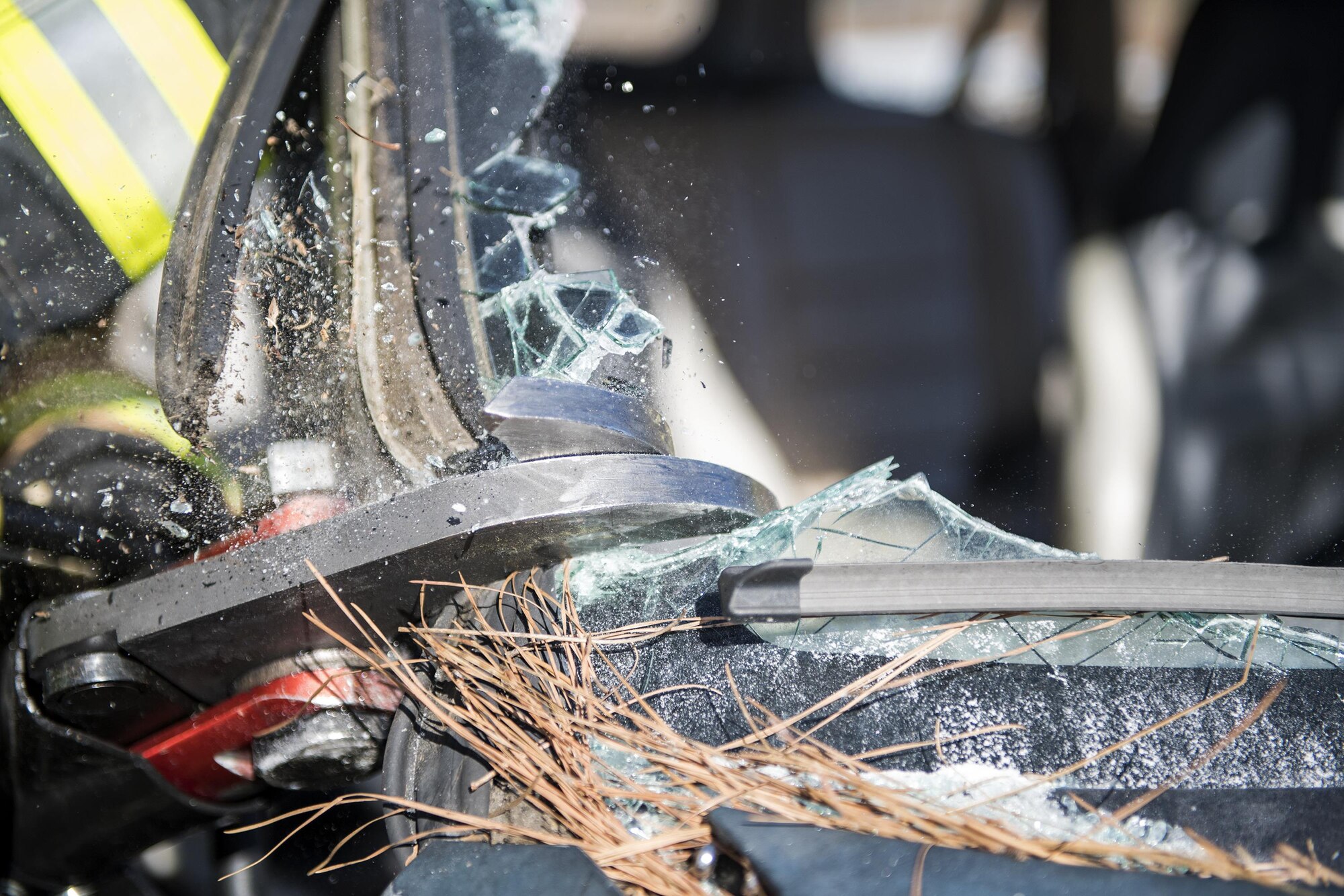 A student uses a hydraulic cutter to cut through a support on a vehicle, during Vehicle Extrication training, Jan. 13, 2017, at Moody Air Force Base, Ga. The cutter is strong enough to cut through sheet metal and hard plastic and is used on vehicles to free trapped passengers. (U.S. Air Force photo by Airman 1st Class Janiqua P. Robinson)