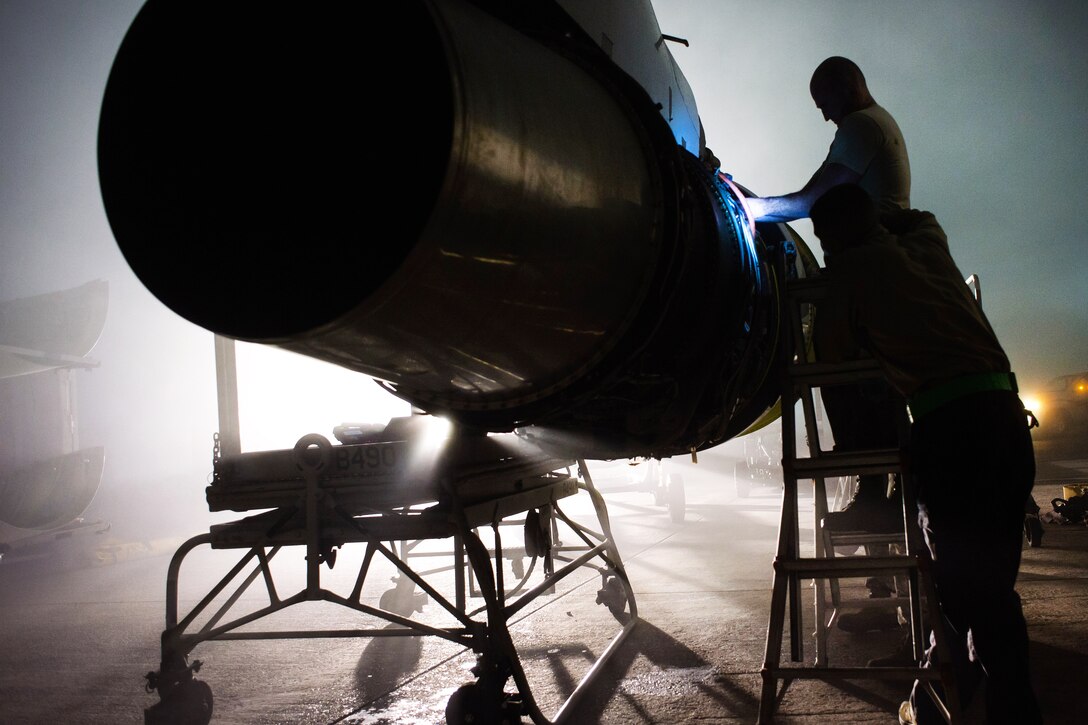 Air Force crew chiefs change out an E-3 Sentry engine in support of Combined Joint Task Force Operation Inherent Resolve in Southwest Asia, Jan. 12, 2017. Air Force photo by Senior Airman Tyler Woodward