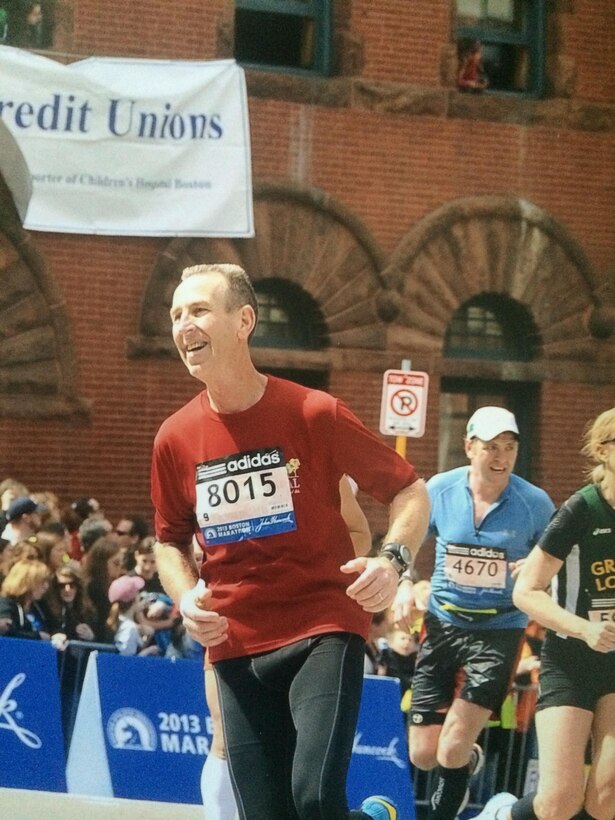 Dave Nickell, unit deployment manager with the 477th Fighter Group at Joint Base Elmendorf-Richardson, Alaska, runs the final leg of the Boston Marathon on Boylston Street, completing his first Boston Marathon April, 2013, shortly before a bomb went of at the finish line. remembers the Boston Marathon tragedy of 2013 while training for the 2017 race.