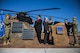 Attendees of a MH-53J Pave Low III dedication ceremony unveil plaques at the end of the ceremony Jan 17, 2017, at the air park on Cannon Air Force Base, N.M. The plaques describe the aircraft’s history and mission accomplishments. (U.S. Air Force photo by Senior Airman Luke Kitterman/Released) 