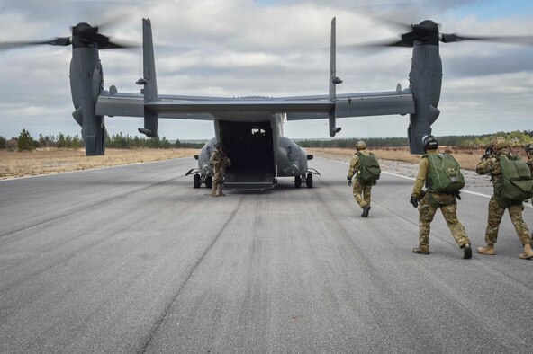 Special Tactics members board a CV-22 Osprey for Chief Master Sgt. Davide Keaton's, 26th Special Tactics Squadron superintendent, final military free fall at Eglin Range, Fla., Jan. 10, 2017. Over the course of Keaton's 30-year career, he was decorated nine times for actions that saved dozens -- if not hundreds-- on and off the battlefield. (U.S. Air Force photo by Senior Airman Ryan Conroy) 