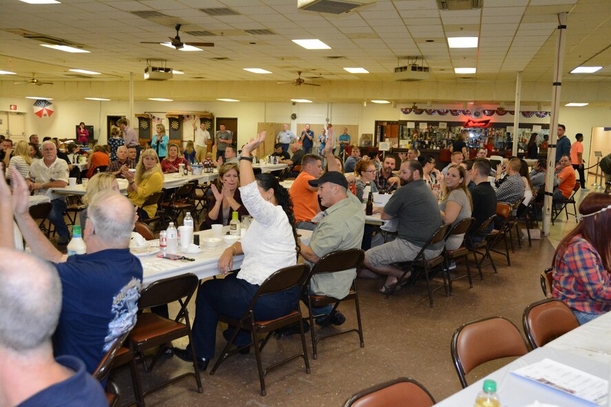 Members of the 507th Air Refueling Wing, 513th Air Control Group and Oklahoma Air National Guard, 137th Special Operations Wing participate in this year’s Operation Holiday Spirit, Nov. 5, 2016. The Operation Holiday Spirit dinner is expected to reach over $35,000 to support guard and Reserve Airmen in need this year. (U.S. Air Force photo/Maj. Jon Quinlan)