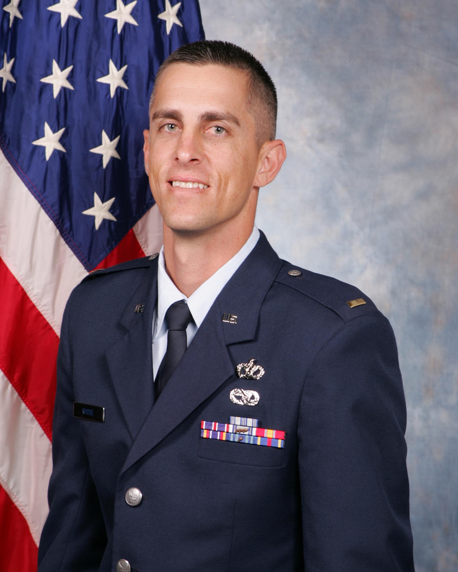 U.S. Air Force 2nd Lt. Jeremy Rhode, who served for nine years as an enlisted member with the 624th Regional Support Group, receives his commission after attending Officer Training School at Maxwell Air Force Base, Alabama, Dec. 11, 2011. Rhode became an officer through the Deserving Airman Commissioning Program, which offers commanders an opportunity to commission enlisted personnel who exhibit exceptional leadership skills. Located on Oahu and Guam, and a component of the Air Force Reserve, the 624th Regional Support Group's mission is to deliver mission essential capability through combat readiness, quality management and peacetime deployments in the Pacific area of responsibility.