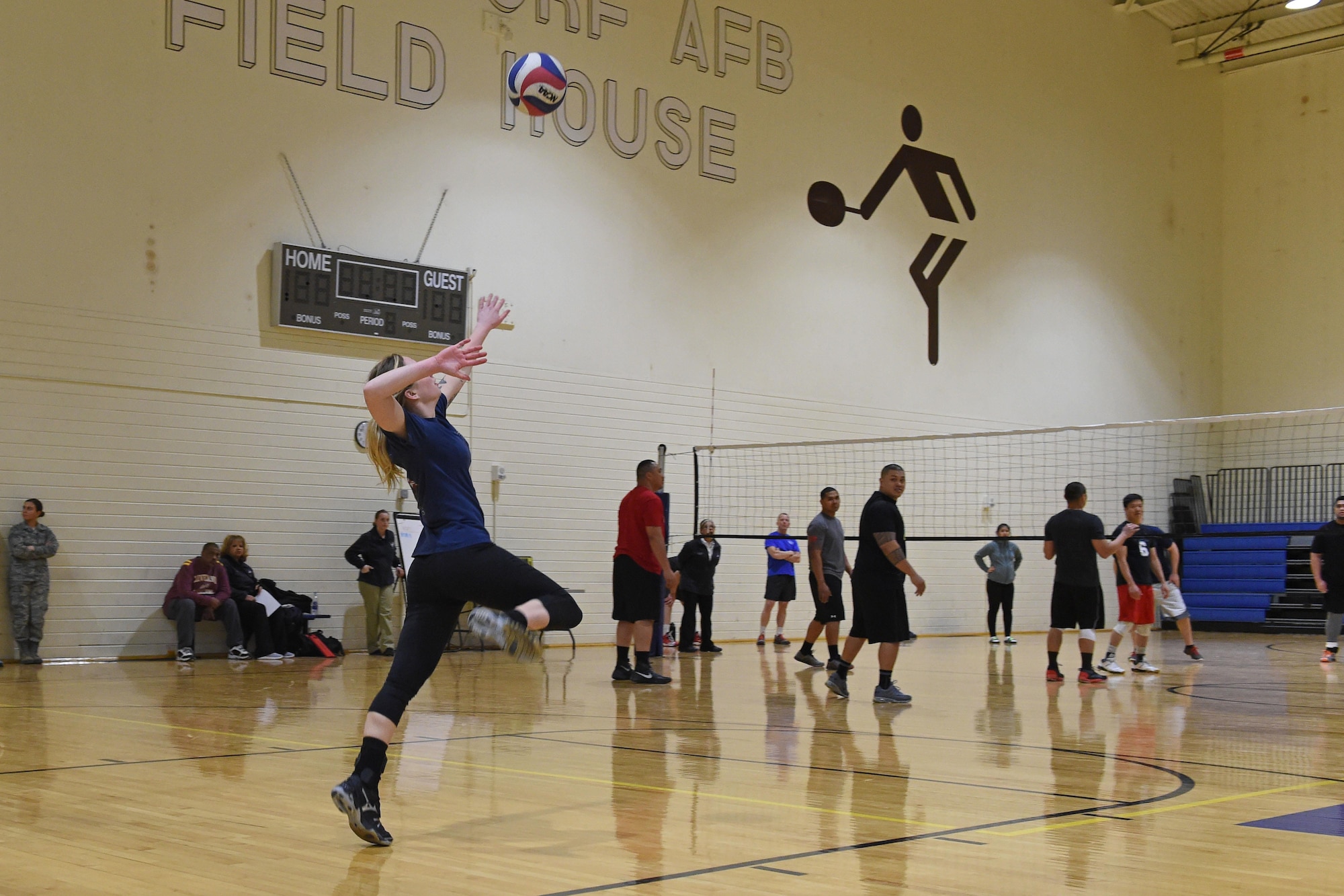 Service members participate in a volleyball tournament hosted at the Joint Base Elmendorf-Richardson Fitness Center, Jan. 12, 2017. Six teams competed in the event and prizes were awarded to first and second place as well the best-dressed team. 