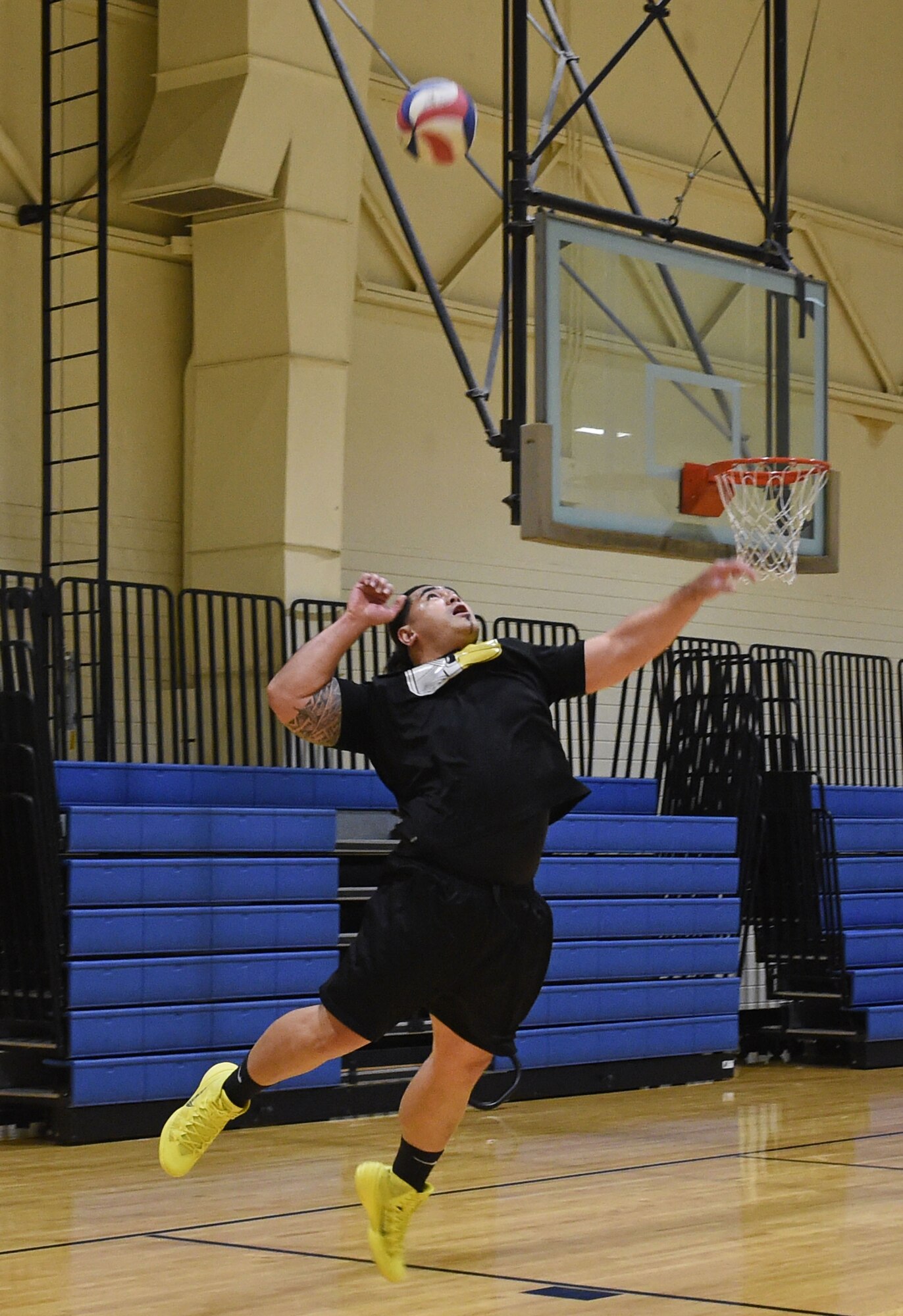 Service members participate in a volleyball tournament hosted at the Joint Base Elmendorf-Richardson Fitness Center, Jan. 12, 2017. Six teams competed in the event and prizes were awarded to first and second place as well the best-dressed team. 