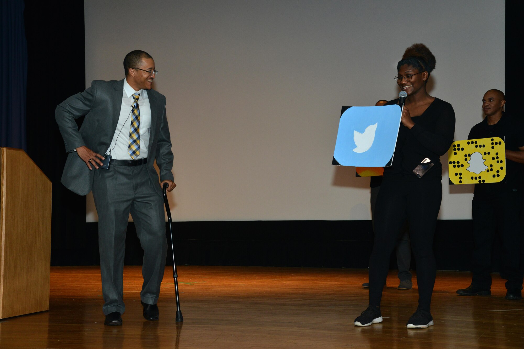 U.S. Air Force Tech. Sgt. Darnell Holyfield, Air Combat Command commander’s support staff NCO in charge, and U.S. Air Force 2nd Lt. Ashley Oates, 83rd Network Operations Squadron plans and programs officer in charge, act in a skit during the Martin Luther King Jr. event at Joint Base Langley-Eustis, Va., Jan. 13, 2017. The Langley African American Heritage Council put together the event to honor Dr. Martin Luther King Jr. for his sacrifices. (U.S. Air Force photo by Airman 1st Class Tristan Biese)