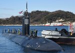 The Los Angeles-class attack submarine USS Topeka (SSN 754) prepares to moor onboard Fleet Activities Yokosuka. Topeka is visiting Yokosuka for a port visit to promote stability and security in the Indo-Asia-Pacific region, demonstrate commitment to regional partners, and foster relationships in the area. 