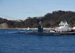 TOKYO BAY, Japan (Jan. 17, 2016) - The Los Angeles-class attack submarine USS Topeka (SSN 754) prepares to moor at Fleet Activities Yokosuka. Topeka is visiting Yokosuka for a port visit. U.S. Navy port visits represent an important opportunity to promote stability and security in the Indo-Asia-Pacific region, demonstrate commitment to regional partners and foster relationships. (U.S. Navy photo by Mass Communication Specialist 2nd Class Brian G. Reynolds/Released)