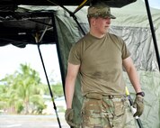 U.S. Army Sgt. Julian Reyes, geospatial engineer with the 5th Engineer Det. Geospatial Planning Cell at Ft. Shafter, Hawaii, helps assemble a Base-X Shelter, Clark Air Base, Philippines, Jan. 15, 2017. Reyes is a member of a 15-person team deployed to the Philippines to support a Pacific Air Forces Subject Matter Expert Exchange with the Philippine Air Force. The two-week long SMEE will concentrate on how Eagle Vision, and satellite imagery, can enhance the two nation's Humanitarian Assistance and Disaster Relief capabilities. (U.S. Air Force photo by Tech. Sgt. James Stewart/Released)