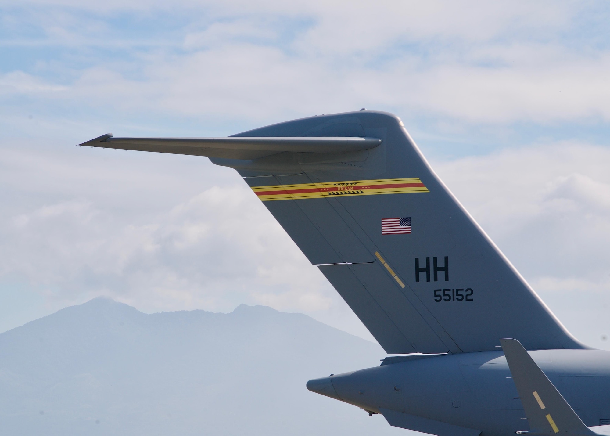 A U.S. Air Force C-17 Globemaster III cargo aircraft sits parked on the flightline at Clark Air Base, Philippines, Jan. 14, 2017. The aircraft transported a team of U.S. Airmen and Soldiers and a ground-based satellite imagery system known as Eagle Vision. While in the Philippines, the U.S. servicemembers will share experiences with their Philippine Air Force allies in using Eagle Vision and satellite imagery as a tool for enhancing their combined Humanitarian Assistance and Disaster Relief capabilities. (U.S. Air Force photo by Tech. Sgt. James Stewart/Released)