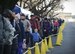 Japanese nationals arrive on base for the 36th Annual Yokota Striders Frostbite Race at Yokota Air Base, Japan, Jan. 15, 2017. The races, which consists of a Half Marathon, 5K, 2K kids and 2K Family Race, promote physical fitness and friendship with Japanese Nationals. (U.S. Air Force photo by Senior Airman Baker)
