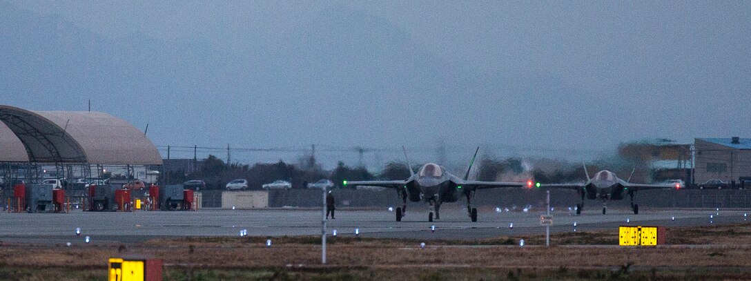 An F-35B Lightning II with Marine Fighter Attack Squadron (VMFA) 121, lands at Marine Corps Air Station Iwakuni, Japan, Jan. 18, 2017. VMFA-121 conducted a permanent change of station to MCAS Iwakuni, from MCAS Yuma, Ariz., and now belongs to Marine Aircraft Group 12, 1st Marine Aircraft Wing, III Marine Expeditionary Force. The F-35B Lightning II is a fifth-generation fighter, which is the world's first operational supersonic short takeoff and vertical landing aircraft. The F-35B brings strategic agility, operational flexibility and tactical supremacy to III MEF with a mission radius greater than that of the F/A-18 Hornet and AV-8B Harrier II in support of the U.S. - Japan alliance. (U.S. Marine Corps photo by Lance Cpl. Jacob A. Farbo)
