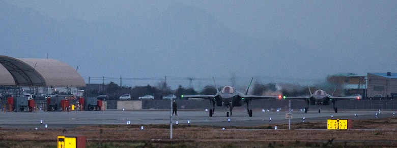 An F-35B Lightning II with Marine Fighter Attack Squadron (VMFA) 121, lands at Marine Corps Air Station Iwakuni, Japan, Jan. 18, 2017. VMFA-121 conducted a permanent change of station to MCAS Iwakuni, from MCAS Yuma, Ariz., and now belongs to Marine Aircraft Group 12, 1st Marine Aircraft Wing, III Marine Expeditionary Force. The F-35B Lightning II is a fifth-generation fighter, which is the world's first operational supersonic short takeoff and vertical landing aircraft. The F-35B brings strategic agility, operational flexibility and tactical supremacy to III MEF with a mission radius greater than that of the F/A-18 Hornet and AV-8B Harrier II in support of the U.S. - Japan alliance. (U.S. Marine Corps photo by Lance Cpl. Jacob A. Farbo)