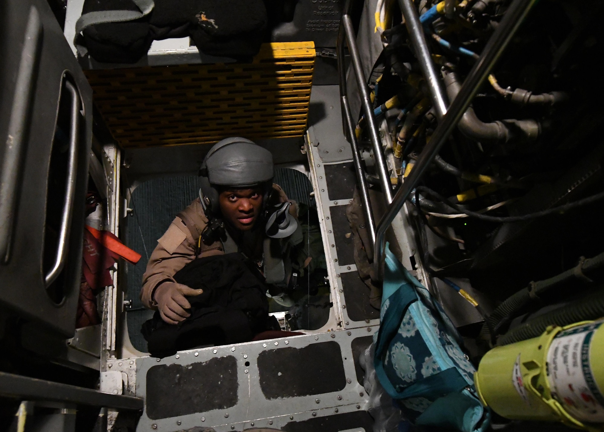 An aircrew member climbs into a B-52 Stratofortress prior to flight at an undisclosed location in Southwest Asia, Jan. 4, 2017. The B-52 is capable of flying at high subsonic speeds at altitudes up to 50,000 feet and can carry nuclear or precision guided conventional ordnance with worldwide precision navigation capability. (U.S. Air Force photo by Senior Airman Miles Wilson)