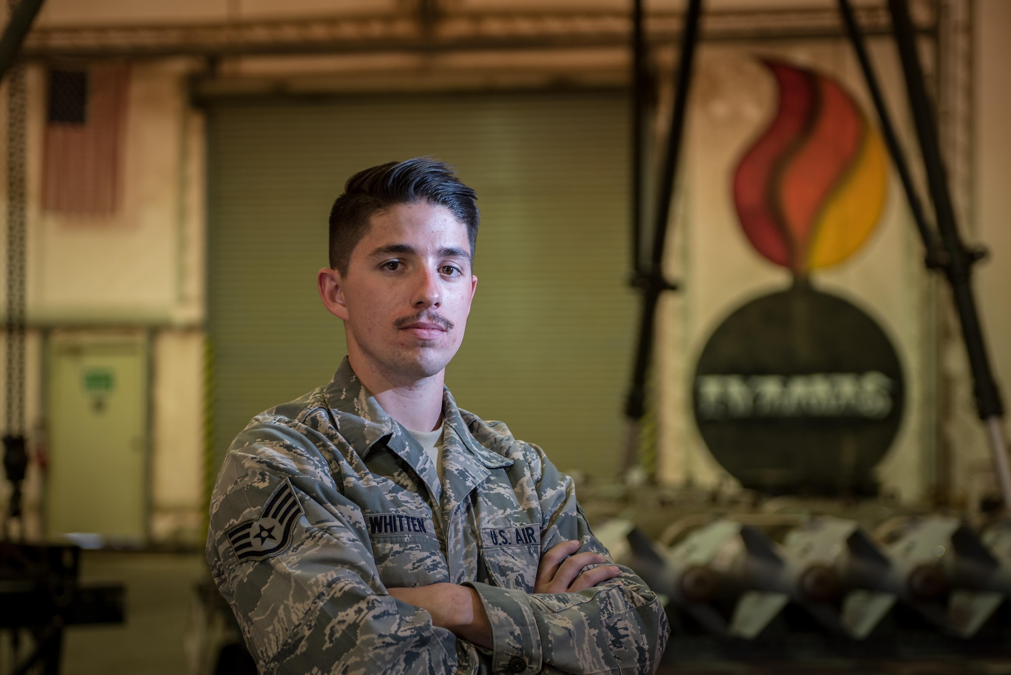 Staff Sgt. Nathaniel Whitten, 407th Expeditionary Maintenance Squadron munitions systems specialist, is one of about 300 Airmen who volunteered to serve on a short-notice deployment in support of Operation Inherent Resolve.(U.S. Air Force photo/Master Sgt. Benjamin Wilson)(Released)