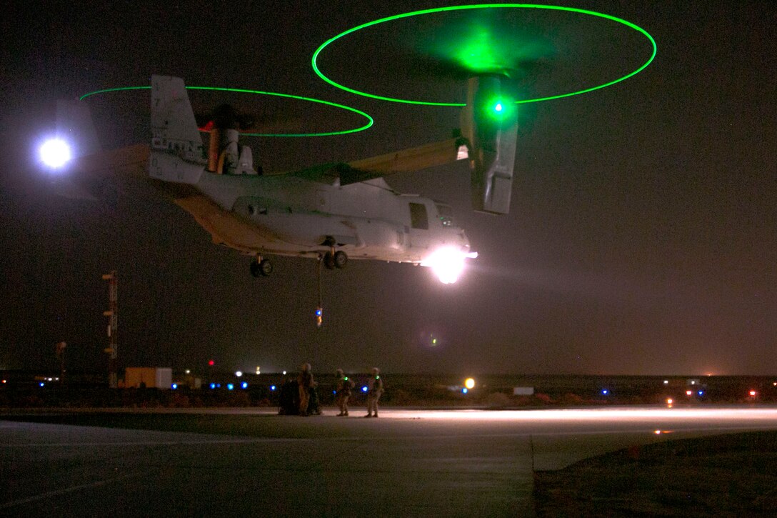 U.S. Marines with Combat Logistics Battalion 7, Special Purpose Marine Air-Ground Task Force-Crisis Response-Central Command, conduct a helicopter support team (HST) training exercise with Marine Medium Tiltrotor Squadron 165 while forward deployed in the Middle East, Jan. 13, 2017. The HST attached large cargo to an MV-22 Osprey in order to quickly transport the cargo to another location. The ability to move cargo or heavy equipment almost anywhere enhances the crisis response capabilities of the SPMAGTF. 