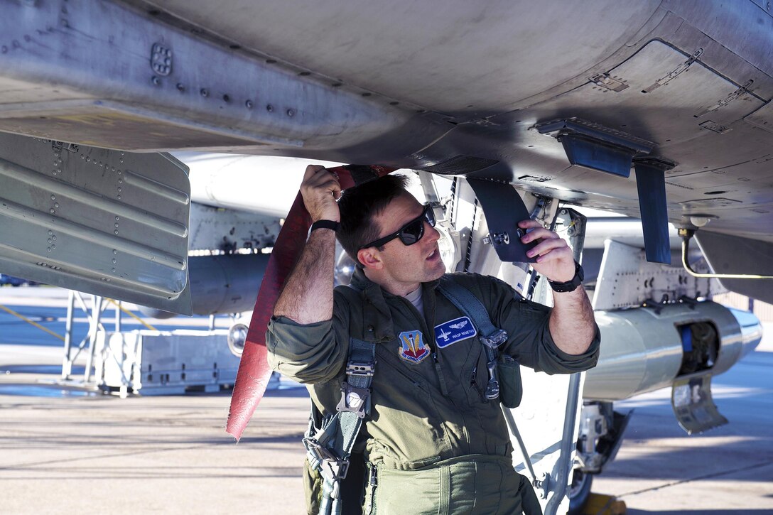 Air Force Capt. Andrew Nemethy performs a preflight inspection before departing Moody Air Force Base, Ga., Jan. 12, 2017, to participate in Green Flag West at Nellis Air Force Base, Nev. Nemethy is a pilot assigned to the 74th Fighter Squadron. Air Force photo by Airman 1st Class Greg Nash