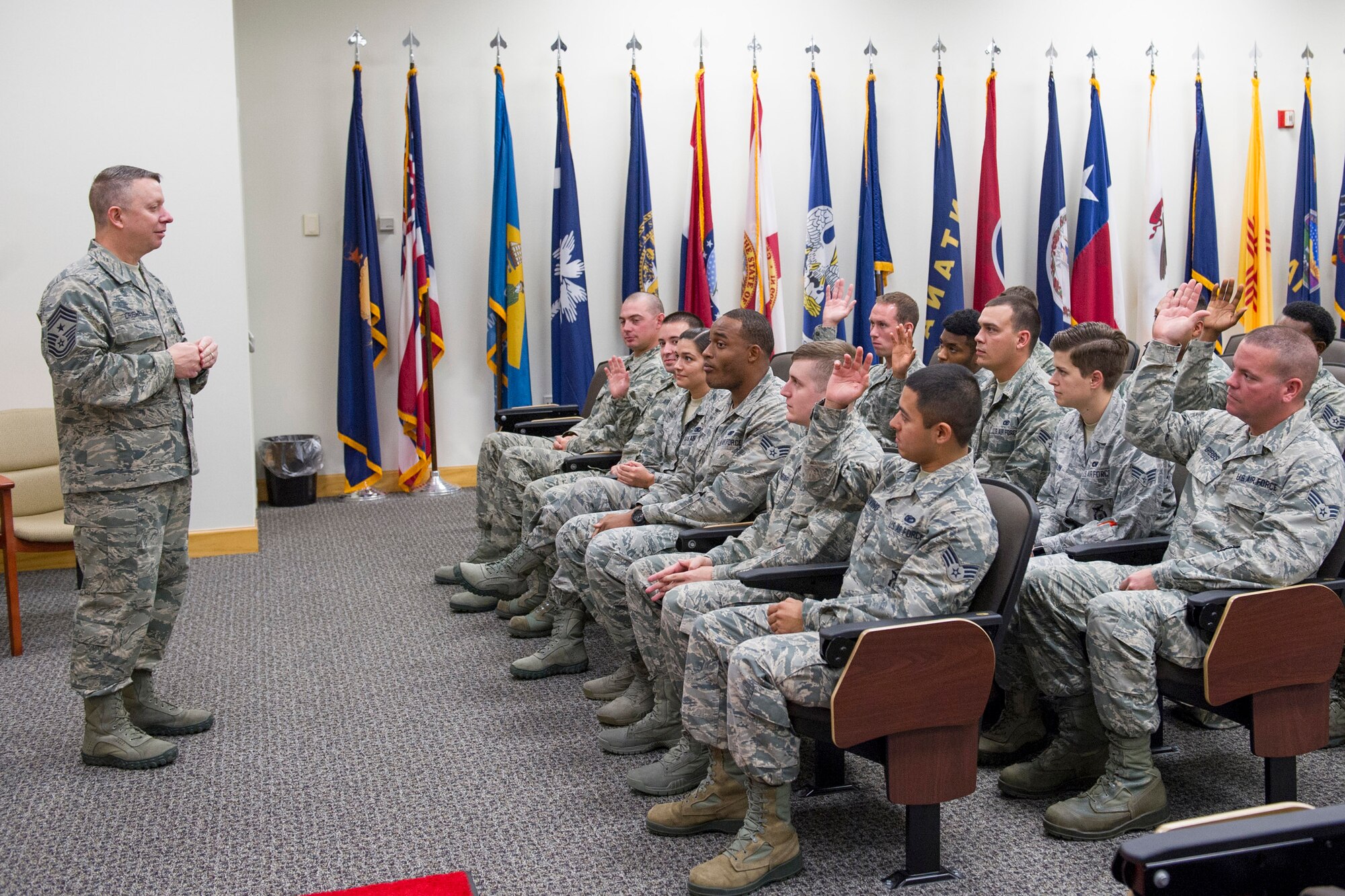 Chief Master Sgt. Brendan Criswell, Air Force Space Command command chief, briefs and motivates Airman Leadership School Airmen at the Professional Development Center, during his visit to Patrick Air Force Base, Fla., Jan. 12, 2017. (U.S. Air Force photo by Matthew Jurgens)