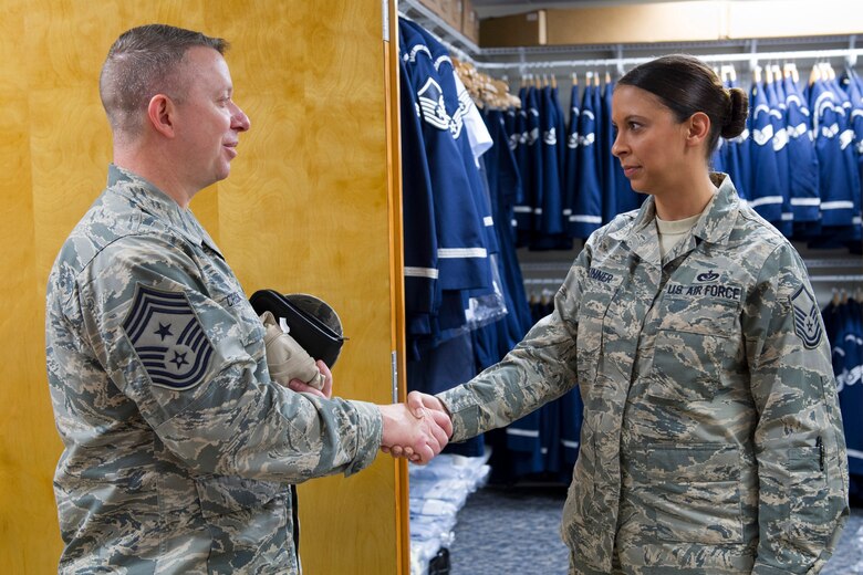 Chief Master Sgt. Brendan Criswell, Air Force Space Command command chief, meets with Master Sgt. Jessica Skinner, 45th Force Support Squadron NCO in charge of Honor Guard, during his visit Jan. 13, 2017, at Patrick Air Force Base, Fla. The Patrick Air Force Base Honor Guard’s mission here is to provide military funeral honors for active duty members, retirees and veterans. (U.S. Air Force photo by Matthew Jurgens)