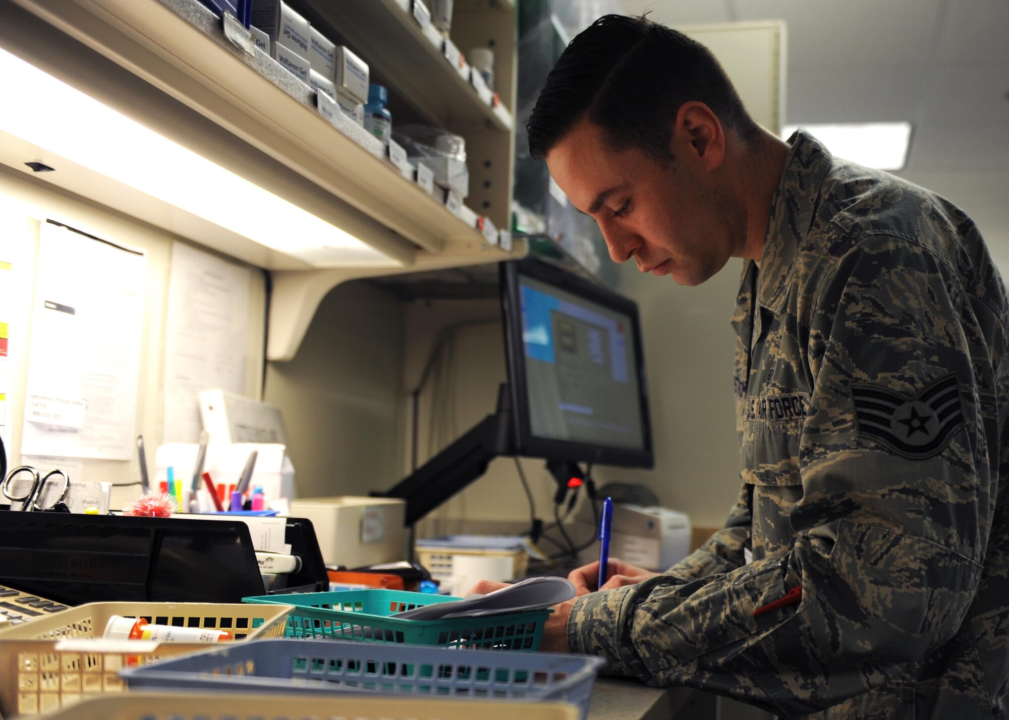 U.S. Air Force Staff Sgt. Zachary Nordstrom, 19th Medical Group pharmacy technician, inspects controlled medication Jan. 12, 2017, at the 19th MDG pharmacy on Little Rock Air Force Base, Ark. Controlled medication is meticulously inspected during prescription preparation to ensure quality assurance. (U.S. Air Force photo by Airman 1st Class Grace Nichols)