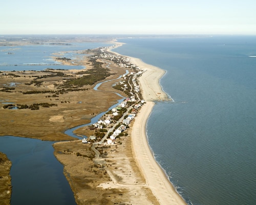 In 2015, the U.S. Army Corps of Engineers' Philadelphia District conducted dredging operations in the Delaware River to deepen the channel and then beneficially used the material to build a dune and berm in Broadkill Beach, DE and reduce the risk of coastal storms for the community. 