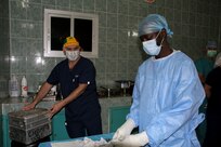 U.S. Army Reserve Sgt. Alexander Tarr, an operating room technician from the 332nd Medical Brigade in Nashville, Tenn., provides surgical instruments to a Senegalese operating room technician prior to a leg realignment surgery during Medical Readiness Training Exercise 17-1 at Hospital Militaire De Ouakam in Dakar, Senegal, Jan. 17, 2017. MEDRETE is a combined effort between the Senegalese government, U.S. Army Africa, the U.S. Army Reserve 332nd Medical Brigade in Nashville, Tenn., and the Vermont Air National Guard. MEDRETE 17-1 is the first in a series of medical readiness training exercises that U.S. Army Africa is scheduled to facilitate within various countries in Africa, and serves as an opportunity for the partnered militaries to hone and strengthen their general surgery and trauma skills while reinforcing the partnership between the countries. The mutually beneficial exercise brings together Senegalese military and U.S. Army medical professionals to foster cooperation while conducting medical specific tasks. 