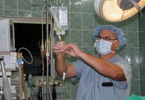 Nurse anesthetist Lt. Col. Edward Alexander, from the 332nd Medical Brigade in Nashville, Tenn., adds prophylactic antibiotics to saline solution prior to a leg realignment surgery during Medical Readiness Training Exercise 17-1 at Hospital Militaire De Ouakam in Dakar, Senegal, Jan. 17, 2017. MEDRETE is a combined effort between the Senegalese government, U.S. Army Africa, the U.S. Army Reserve 332nd Medical Brigade in Nashville, Tenn., and the Vermont Air National Guard. MEDRETE 17-1 is the first in a series of medical readiness training exercises that U.S. Army Africa is scheduled to facilitate within various countries in Africa, and serves as an opportunity for the partnered militaries to hone and strengthen their general surgery and trauma skills while reinforcing the partnership between the countries. The mutually beneficial exercise brings together Senegalese military and U.S. Army medical professionals to foster cooperation while conducting medical specific tasks. 