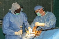Senegalese surgeon Boubacar Mbaye and Vermont Air National Guard surgeon Maj. Anthony Donaldson conduct a leg realignment surgery during Medical Readiness Training Exercise 17-1 at Hospital Militaire De Ouakam in Dakar, Senegal, Jan. 17, 2017. MEDRETE is a combined effort between the Senegalese government, U.S. Army Africa, the U.S. Army Reserve 332nd Medical Brigade in Nashville, Tenn., and the Vermont Air National Guard. MEDRETE 17-1 is the first in a series of medical readiness training exercises that U.S. Army Africa is scheduled to facilitate within various countries in Africa, and serves as an opportunity for the partnered militaries to hone and strengthen their general surgery and trauma skills while reinforcing the partnership between the countries. The mutually beneficial exercise brings together Senegalese military and U.S. Army medical professionals to foster cooperation while conducting medical specific tasks. 
