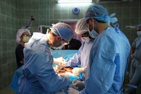 Maj. Anthony Donaldson, a urologist from the Vermont Air National Guard in Burlington, Vermont, Senegalese urologist Dr. Niang, and a Moroccan intern conduct surgery to remove a bladder stone from a patient during Medical Readiness Training Exercise 17-1 at Hospital Militaire De Ouakam in Dakar, Senegal, Jan. 18, 2017. MEDRETE is a combined effort between the Senegalese government, U.S. Army Africa, the U.S. Army Reserve 332nd Medical Brigade in Nashville, Tenn., and the Vermont Air National Guard. MEDRETE 17-1 is the first in a series of medical readiness training exercises that U.S. Army Africa is scheduled to facilitate within various countries in Africa, and serves as an opportunity for the partnered militaries to hone and strengthen their general surgery and trauma skills while reinforcing the partnership between the countries. The mutually beneficial exercise brings together Senegalese military and U.S. Army medical professionals to foster cooperation while conducting medical specific tasks.