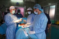 Maj. Anthony Donaldson, a urologist from the Vermont Air National Guard in Burlington, Vermont, Senegalese urologist Dr. Niang, and a Moroccan intern conduct surgery to remove a bladder stone from a patient during Medical Readiness Training Exercise 17-1 at Hospital Militaire De Ouakam in Dakar, Senegal, Jan. 18, 2017. MEDRETE is a combined effort between the Senegalese government, U.S. Army Africa, the U.S. Army Reserve 332nd Medical Brigade in Nashville, Tenn., and the Vermont Air National Guard. MEDRETE 17-1 is the first in a series of medical readiness training exercises that U.S. Army Africa is scheduled to facilitate within various countries in Africa, and serves as an opportunity for the partnered militaries to hone and strengthen their general surgery and trauma skills while reinforcing the partnership between the countries. The mutually beneficial exercise brings together Senegalese military and U.S. Army medical professionals to foster cooperation while conducting medical specific tasks. 