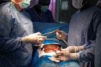 Maj. Anthony Donaldson, a urologist from the Vermont Air National Guard in Burlington, Vermont, Senegalese urologist Dr. Niang, and a Moroccan intern conduct surgery to remove a bladder stone from a patient during Medical Readiness Training Exercise 17-1 at Hospital Militaire De Ouakam in Dakar, Senegal, Jan. 18, 2017. MEDRETE is a combined effort between the Senegalese government, U.S. Army Africa, the U.S. Army Reserve 332nd Medical Brigade in Nashville, Tenn., and the Vermont Air National Guard. MEDRETE 17-1 is the first in a series of medical readiness training exercises that U.S. Army Africa is scheduled to facilitate within various countries in Africa, and serves as an opportunity for the partnered militaries to hone and strengthen their general surgery and trauma skills while reinforcing the partnership between the countries. The mutually beneficial exercise brings together Senegalese military and U.S. Army medical professionals to foster cooperation while conducting medical specific tasks. 