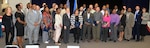 The graduates of the Onward to Opportunity Program and others gather for a group photo at the Joint Base San Antonio-Fort Sam Houston Military & Family Readiness Center Jan. 17.